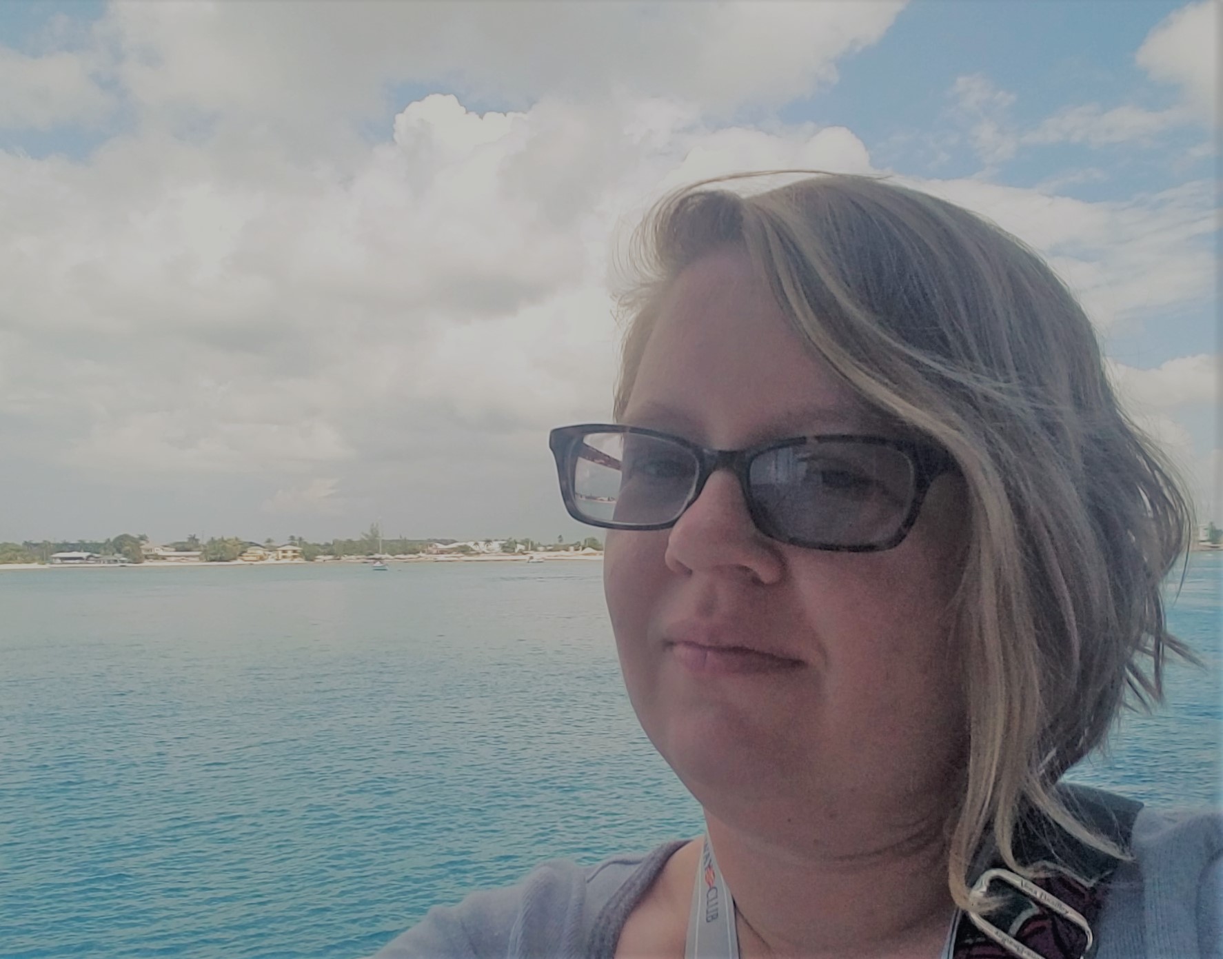 Profile picture of Kay Davis at a beach.